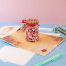 Carte pop-up Un verre plein d'amour