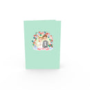 Brautpaar unter Blumenbogen Pop-Up Karte