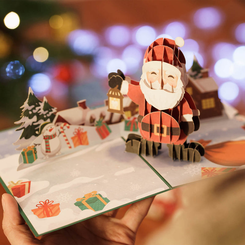Carte pop-up Père Noël avec lanterne